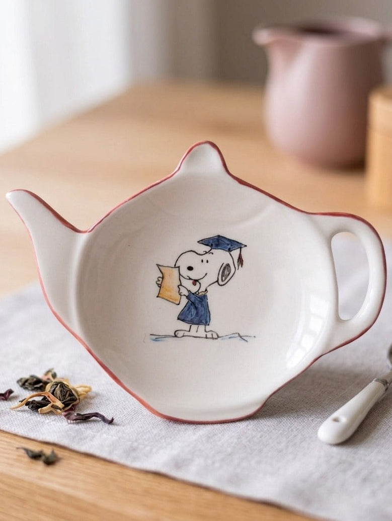 Poggiabustine da tè Snoopy Laureato
