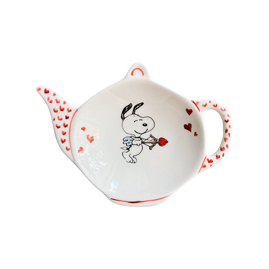 Poggiabustine da tè Snoopy cupido